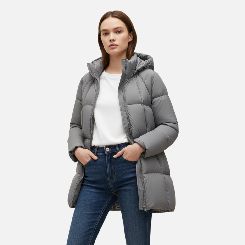 Sauvoire | Zwarte dames pufferjas – lange gewatteerde winterjas met capuchon