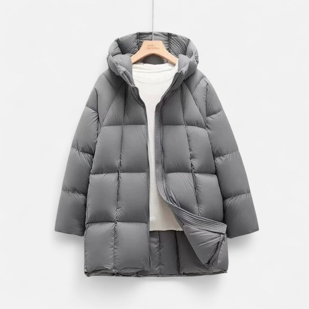 Sauvoire | Zwarte dames pufferjas – lange gewatteerde winterjas met capuchon